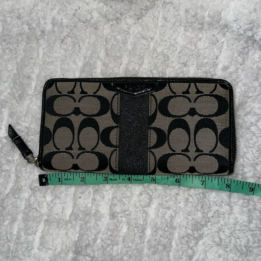 Coach signature tan and black zip around long wallet silver hardware